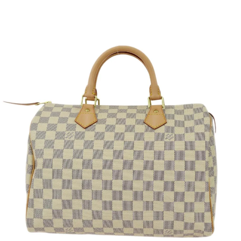 Ladies Louis Vuitton Petite Malle bags in a pastel color for a soft lookLouis Vuitton 2011 Damier Azur Speedy 30 N41533