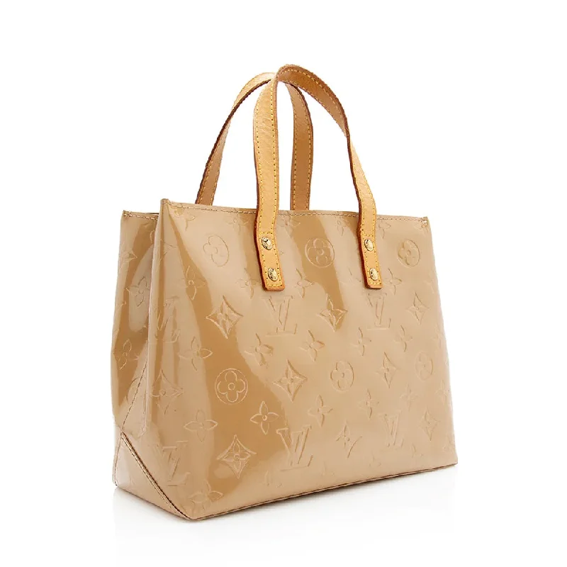 Louis Vuitton Twist bags with a contrast - colored interior for visual interestLOUIS VUITTON MONOGRAM VERNIS READE PM TOTE BAG