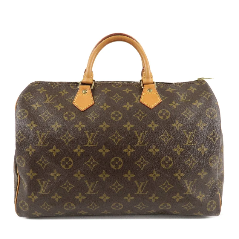 Louis Vuitton Twist bags with a crystal - embellished LV - turnlockLouis Vuitton Monogram Speedy 35 Hand Bag Boston Bag M41524