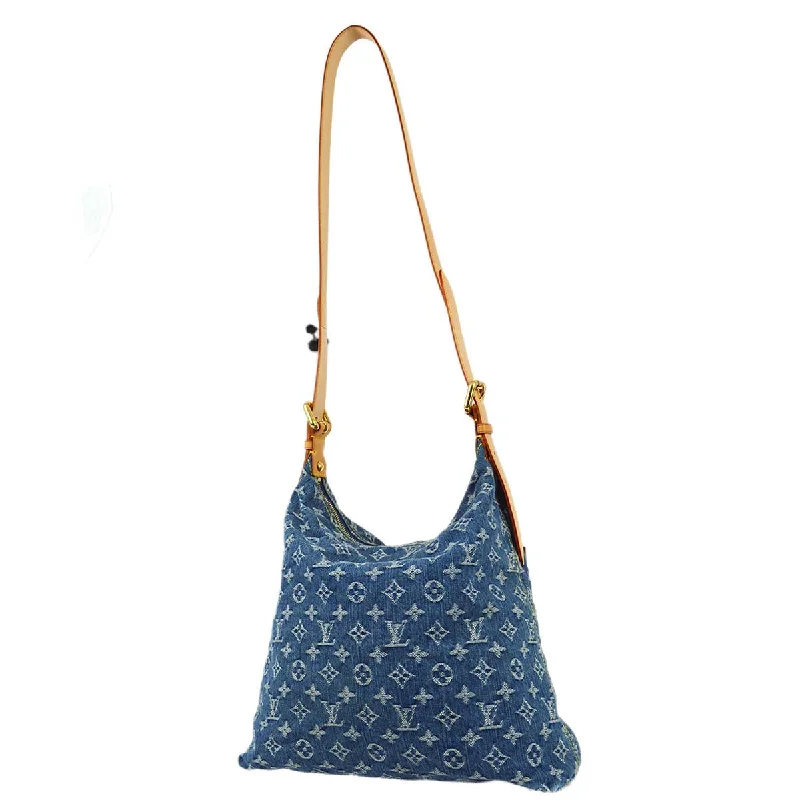 Louis Vuitton Twist bags with a contrast - colored interior for visual interestLouis Vuitton 2005 Blue Monogram Denim Baggy GM Shoulder Bag M95048