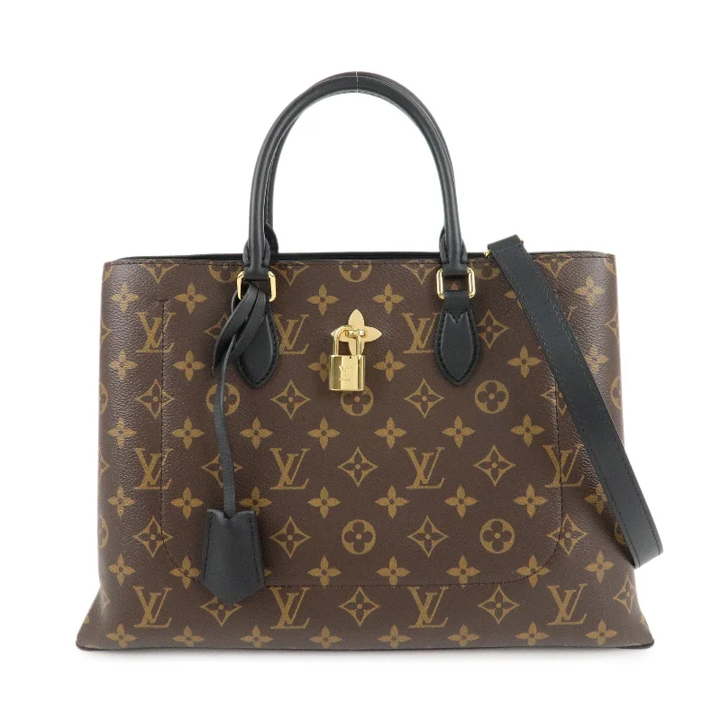 Louis Vuitton Alma bags with a monogram - embossed leather surfaceLouis Vuitton Monogram Flower Tote Bag 2Way Bag Noir M43550