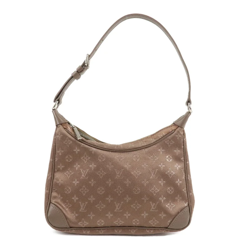 Louis Vuitton Twist bags with the iconic LV - turnlock closureLouis Vuitton Monogram Satin Little Boulogne Hand Bag M92143