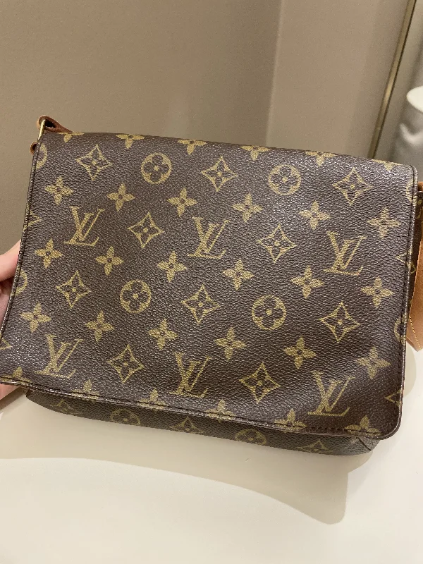 Louis Vuitton Speedy bags in monogram canvas for a classic lookLouis Vuitton Musette Tango Shoulder Bag Monogram