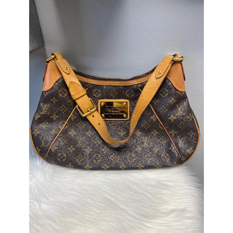 Louis Vuitton tote bags with a double - handle and shoulder - strap optionLouis Vuitton Monogram Thames GM