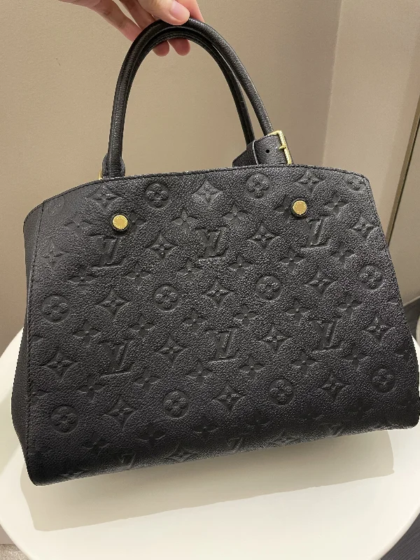 Louis Vuitton tote bags with a printed LV logo on the front for brand visibilityLouis Vuitton Montaigne MM Black Empreinte