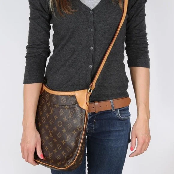 Ladies Louis Vuitton Capucines bags with a detachable shoulder strapLOUIS VUITTON Monogram Canvas Odeon MM Bag