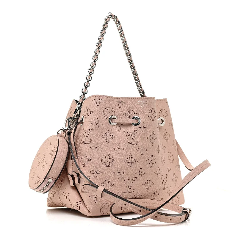 Ladies Louis Vuitton Petite Malle bags in a pastel color for a soft lookLOUIS VUITTON BELLA BUCKET MAHINA BAG