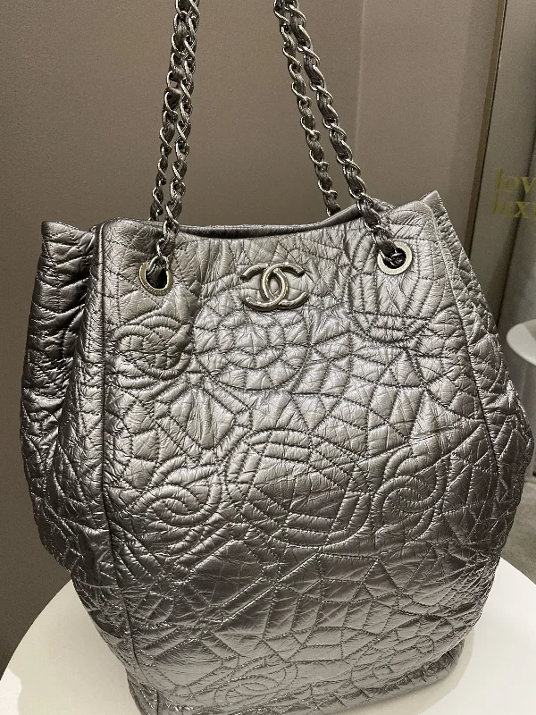 Chanel All - Match Handbag for Versatile StylingChanel Camilla Graphic Embossed Bag Silver Patent