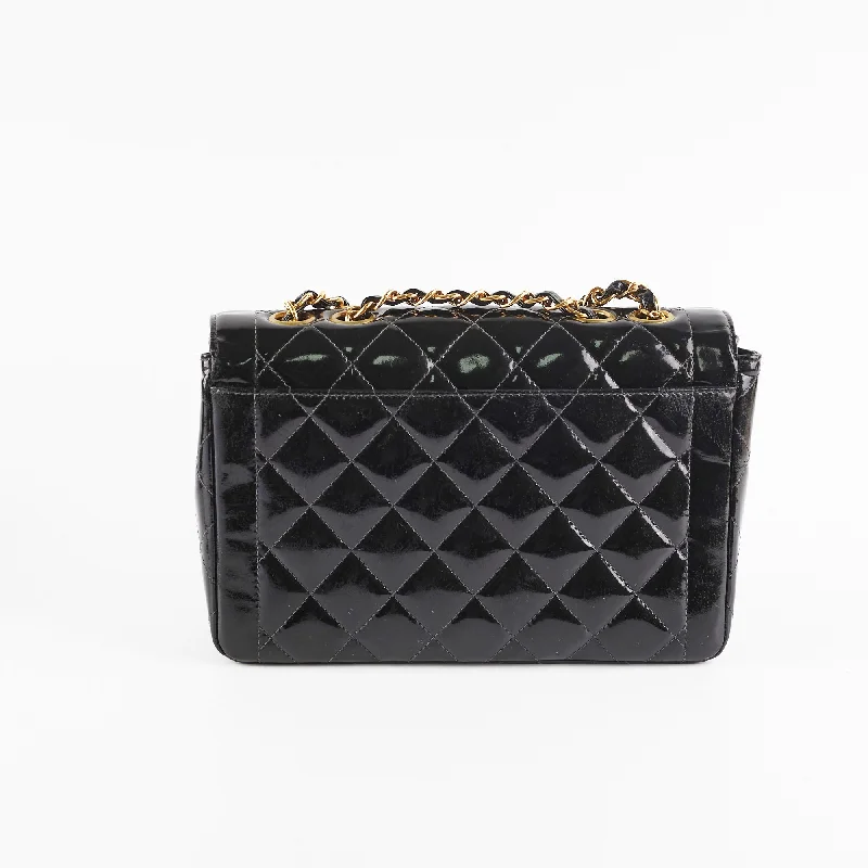 Chanel Quilted Leather Shoulder Bag for FashionistasChanel Vintage Patent Black Flap Bag