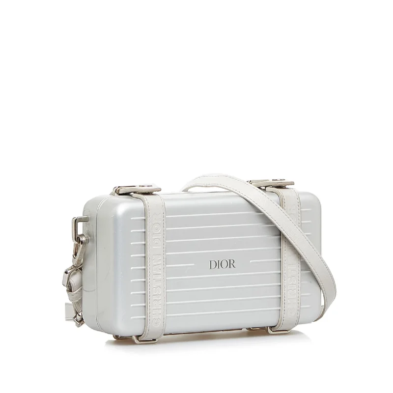 Christian Dior handbags with a snap - button closure and a decorative buckleDior Dior x Rimowa Personal Utility Case (AancJw)