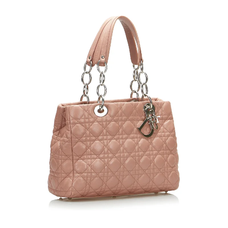 Christian Dior Saddle bags with a patent leather finish for a shiny lookDior Lady Dior Soft Shopper Pink Cannage Quilted Leather