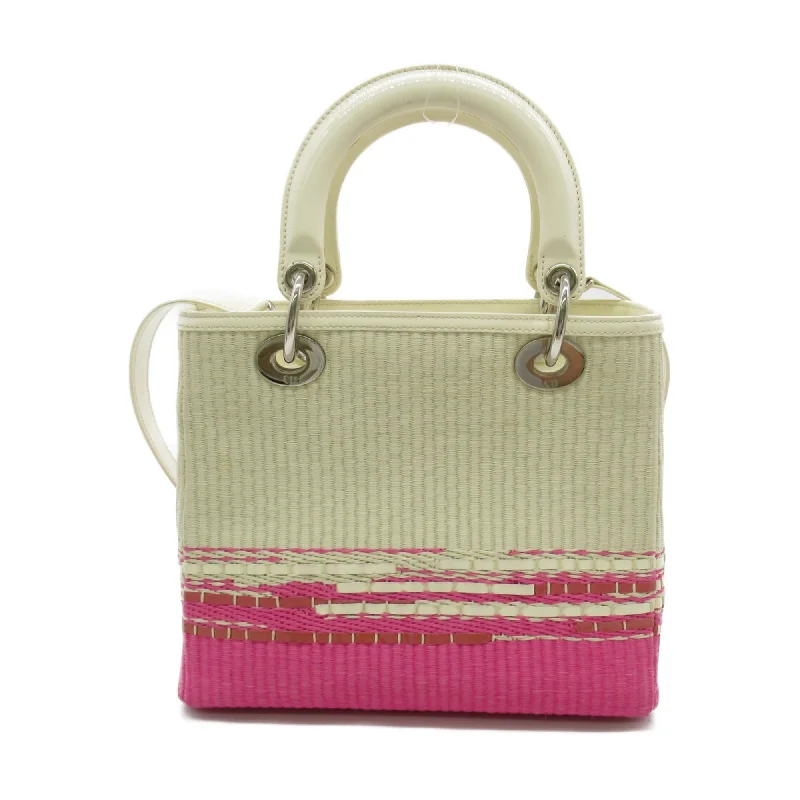 Christian Dior Saddle bags with a studded trim for a bold lookDior Lady Dior Tote Bag White Pink enamel