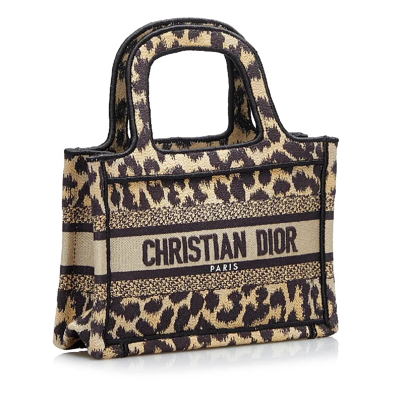 Christian Dior bags with a detachable coin purse insideChristian Dior Mizza Mini Book Tote