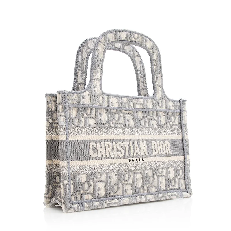 Christian Dior Saddle bags with a studded trim for a bold lookChristian Dior Oblique Mini Book Tote