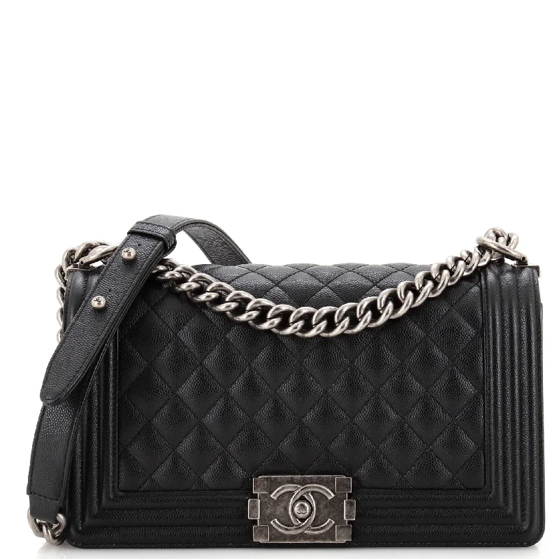 Christian Dior handbags with a snap - button closure and a decorative buckleBoy Flap Bag Quilted Caviar New Medium