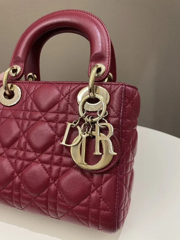 Contemporary Christian Dior handbags with a unique shapeDior Lady Dior Mini Deep Red