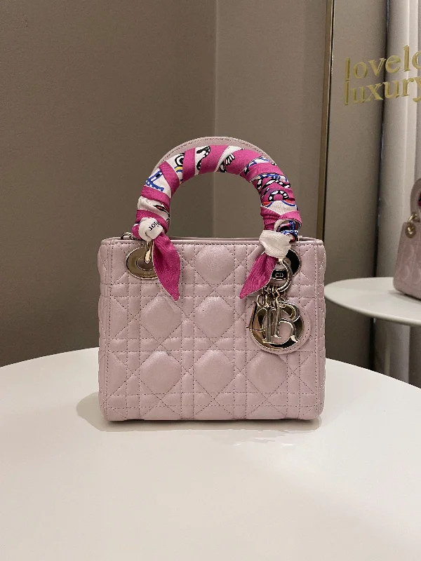 Christian Dior Saddle bags with a studded trim for a bold lookDior Lady Dior Mini Lotus Pink Lilac